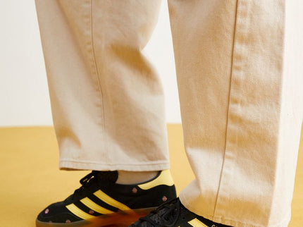 Adidas Gazelle Indoor Core Black Almost Yellow Floral (Women's) IF4490 SneakerMood On feet, side view