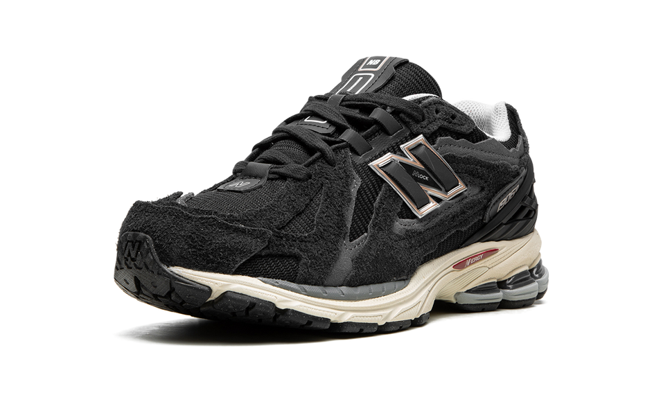 New Balance 1906D Protection Pack Black M1906DD SneakerMood Front three-quarter view