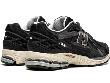 New Balance 1906D Protection Pack Black M1906DD SneakerMood Pair, rear three-quarter view