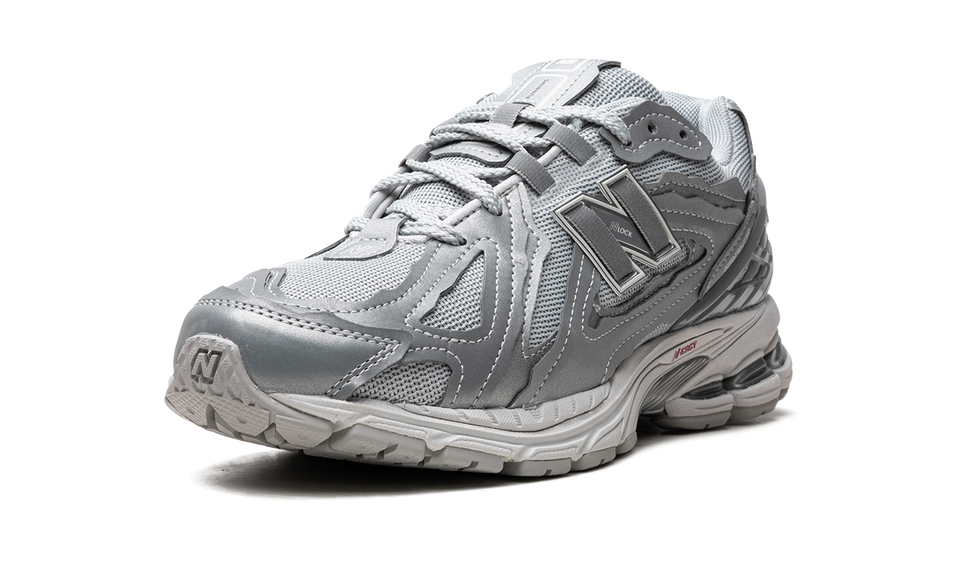 New Balance 1906D Protection Pack Silver Metallic M1906DH SneakerMood Front three-quarter view