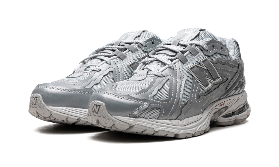 New Balance 1906D Protection Pack Silver Metallic M1906DH SneakerMood Pair, front three-quarter view
