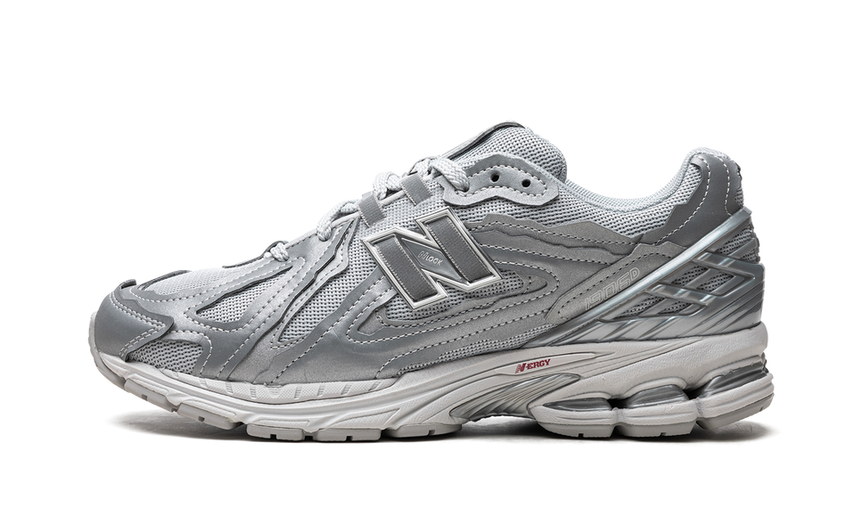 New Balance 1906D Protection Pack Silver Metallic M1906DH SneakerMood Side view, toe pointing left