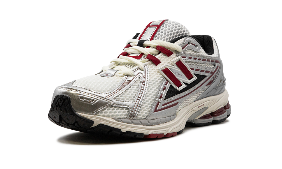 New Balance 1906R Silver Classic Crimson M1906REA SneakerMood Front three-quarter view