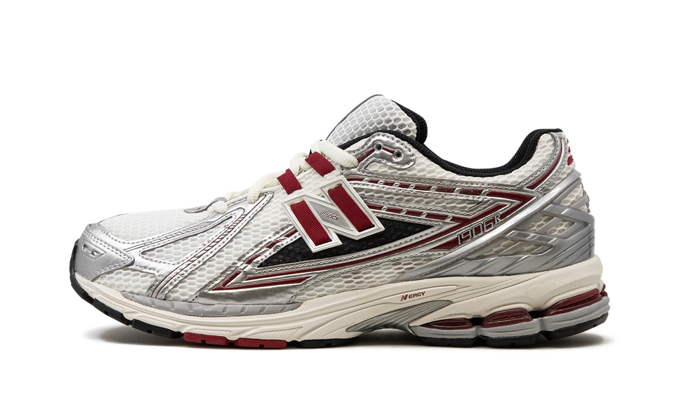 New Balance 1906R Silver Classic Crimson M1906REA SneakerMood Side view, toe pointing left