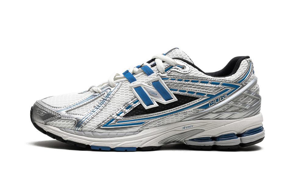 New Balance 1906R Silver Metallic Blue Agate M1906REB SneakerMood Side view, toe pointing left