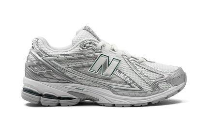 New Balance 1906R Silver Metallic Sea Salt M1906REE SneakerMood Side view, toe pointing right