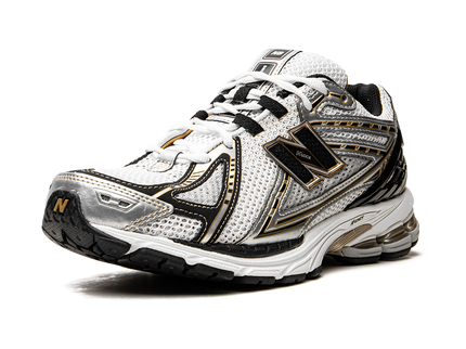 New Balance 1906R White Metallic Gold M1906RA SneakerMood Front three-quarter view