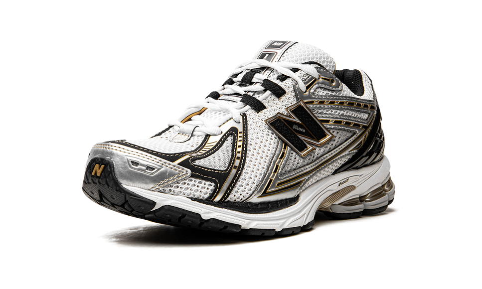New Balance 1906R White Metallic Gold M1906RA SneakerMood Front three-quarter view
