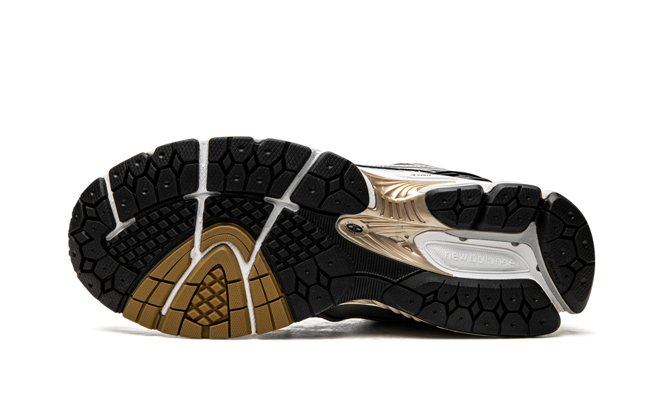 New Balance 1906R White Metallic Gold M1906RA SneakerMood Outsole view