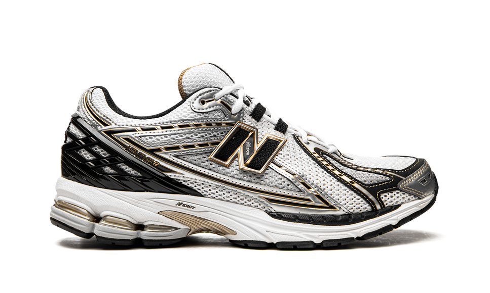 New Balance 1906R White Metallic Gold M1906RA SneakerMood Side view, toe pointing right