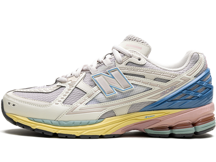New Balance 1906U Lunar New Year M1906NC SneakerMood Side view, toe pointing left