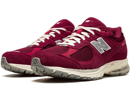 New Balance 2002R Bordeaux M2002RHA SneakerMood Pair, front three-quarter view