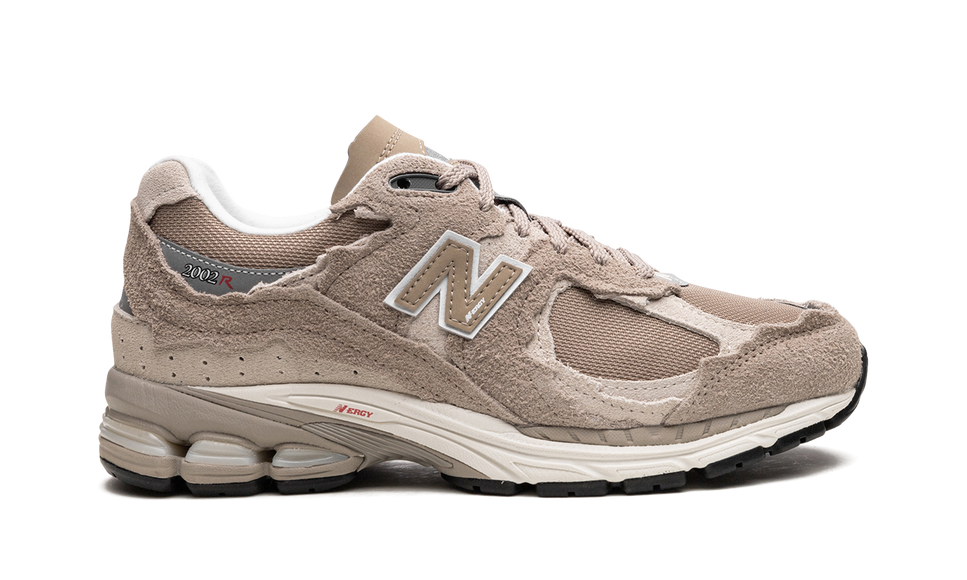 New Balance 2002R Protection Pack Driftwood M2002RDL SneakerMood Side view, toe pointing right