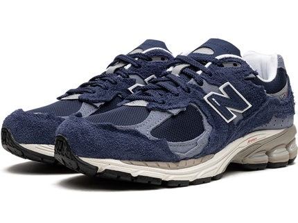 New Balance 2002R Protection Pack Navy Grey M2002RDK SneakerMood Pair, front three-quarter view