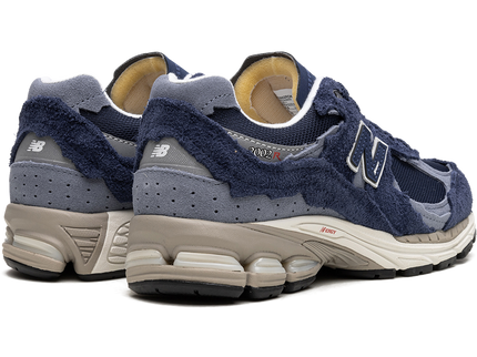 New Balance 2002R Protection Pack Navy Grey M2002RDK SneakerMood Pair, rear three-quarter view