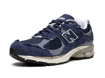 New Balance 2002R Protection Pack Navy Grey M2002RDK SneakerMood Front three-quarter view