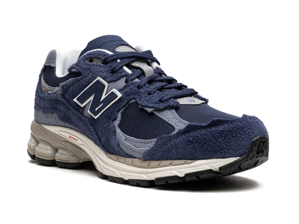 New Balance 2002R Protection Pack Navy Grey M2002RDK SneakerMood Front three-quarter view