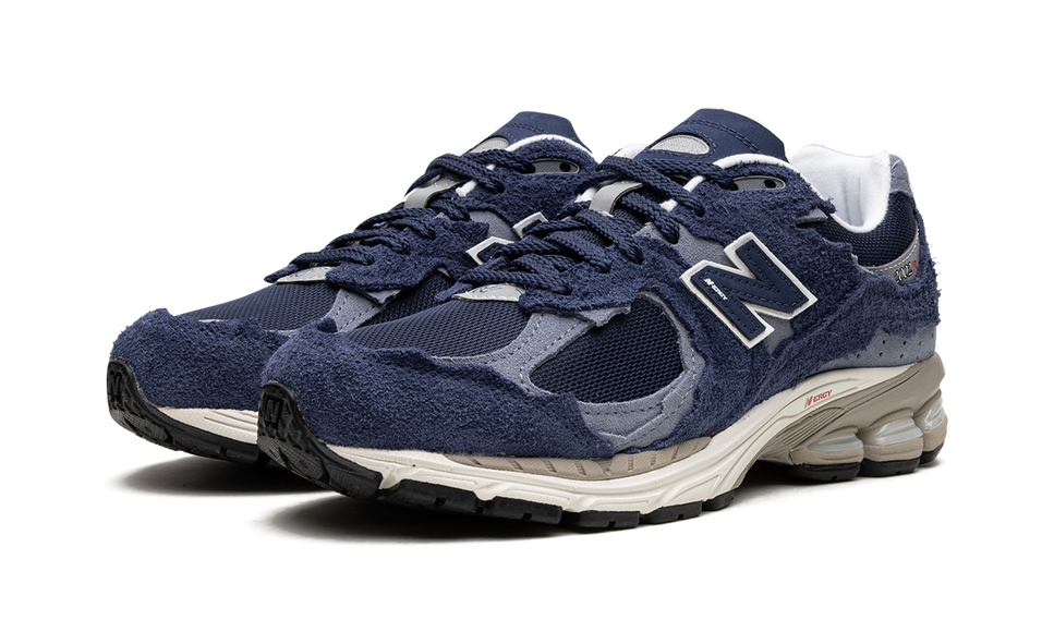 New Balance 2002R Protection Pack Navy Grey M2002RDK SneakerMood Pair, front three-quarter view