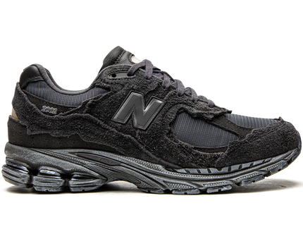 New Balance 2002R Protection Pack Phantom M2002RDB SneakerMood Side view, toe pointing right