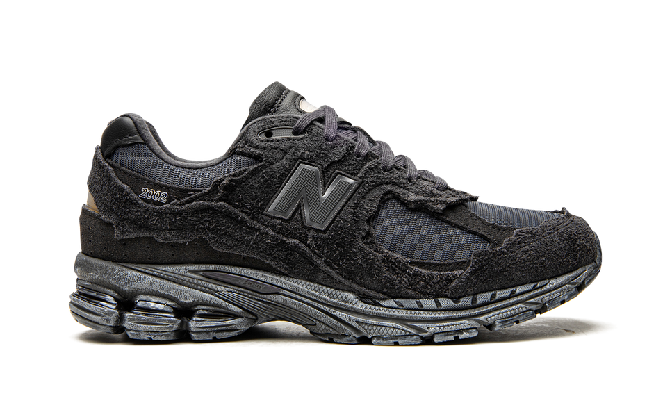 New Balance 2002R Protection Pack Phantom M2002RDB SneakerMood Side view, toe pointing right