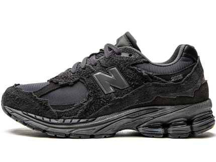 New Balance 2002R Protection Pack Phantom M2002RDB SneakerMood Side view, toe pointing left