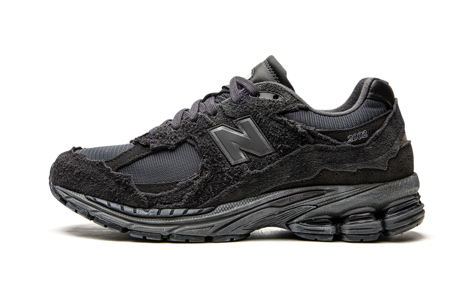 New Balance 2002R Protection Pack Phantom M2002RDB SneakerMood Side view, toe pointing left