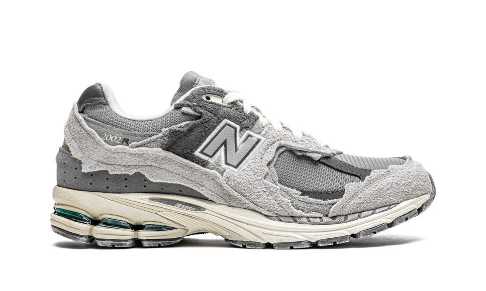 New Balance 2002R Protection Pack Rain Cloud M2002RDA SneakerMood Side view, toe pointing right