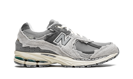 New Balance 2002R Protection Pack Rain Cloud M2002RDA SneakerMood Side view, toe pointing right