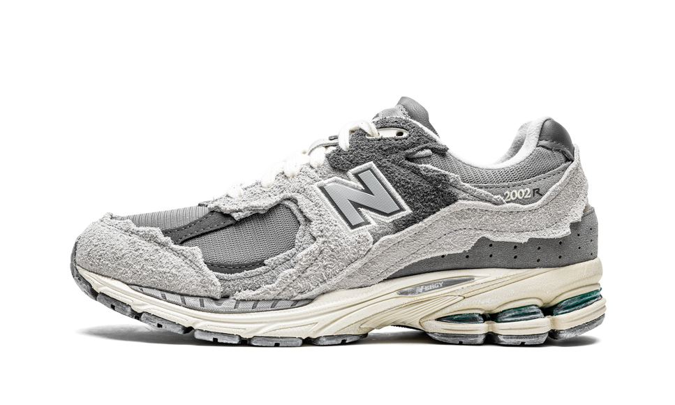 New Balance 2002R Protection Pack Rain Cloud M2002RDA SneakerMood Side view, toe pointing left