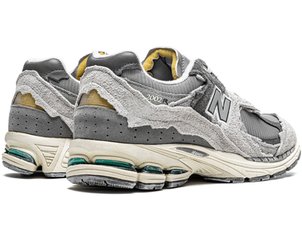 New Balance 2002R Protection Pack Rain Cloud M2002RDA SneakerMood Pair, rear three-quarter view