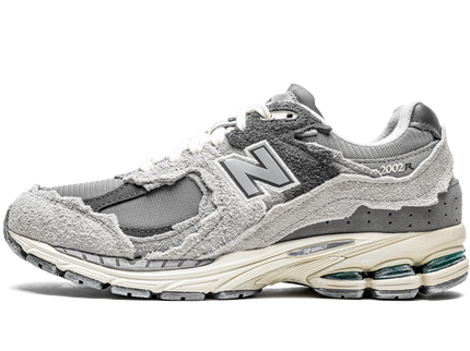 New Balance 2002R Protection Pack Rain Cloud M2002RDA SneakerMood Side view, toe pointing left
