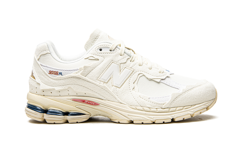 New Balance 2002R Protection Pack Sea Salt M2002RDC SneakerMood Side view, toe pointing right