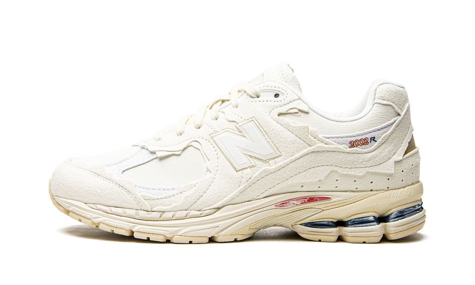 New Balance 2002R Protection Pack Sea Salt M2002RDC SneakerMood Side view, toe pointing left
