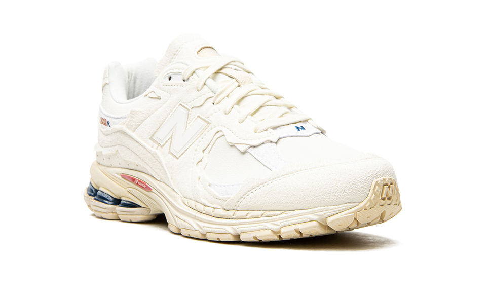 New Balance 2002R Protection Pack Sea Salt M2002RDC SneakerMood Front three-quarter view