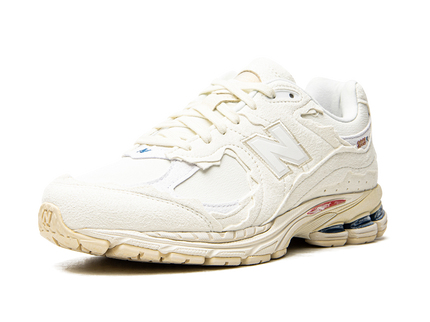 New Balance 2002R Protection Pack Sea Salt M2002RDC SneakerMood Front three-quarter view