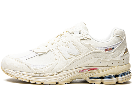New Balance 2002R Protection Pack Sea Salt M2002RDC SneakerMood Side view, toe pointing left