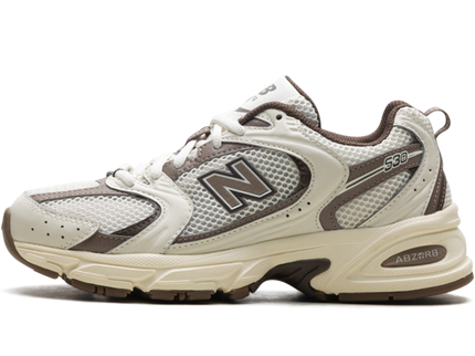 New Balance 530 Turtledove Mushroom MR530ASM SneakerMood Side view, toe pointing left