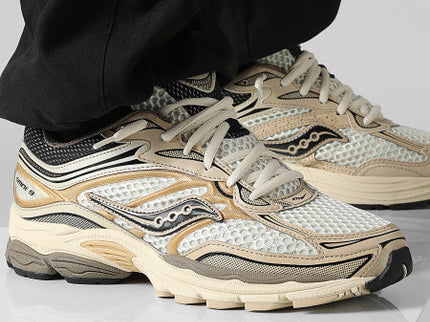 Saucony ProGrid Omni 9 Gold S70739-7 SneakerMood On feet, side view